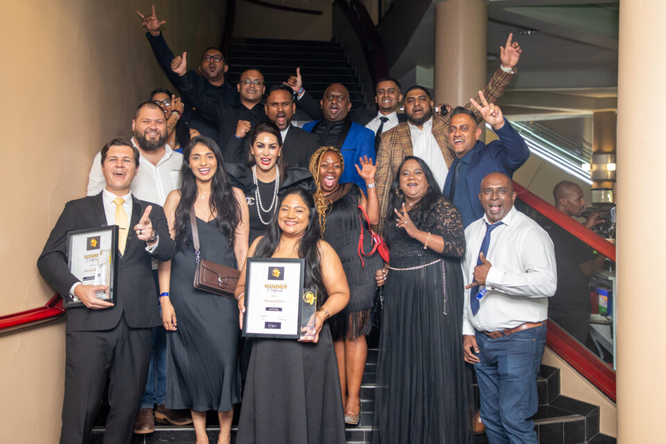 Rewardsco team celebrating an industry award win